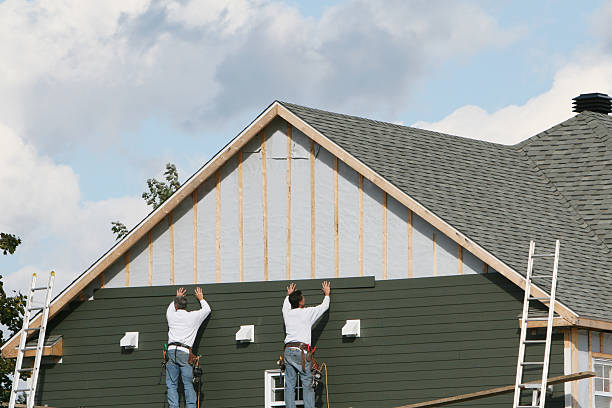 Professional Siding Installation technician working in Forest Park, IL